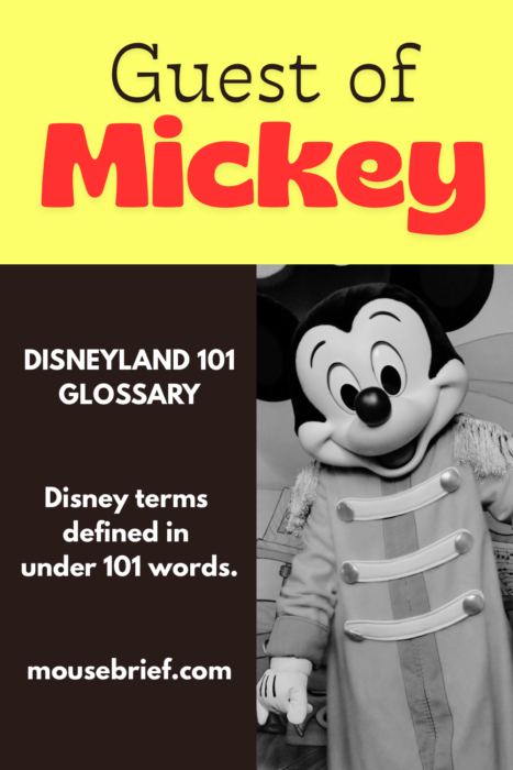 Black and white photo of Mickey Mouse character in his band uniform with text “Guest of Mickey, Disneyland 101 Glossary: Disney terms defined in under 101 words. mousebrief.com