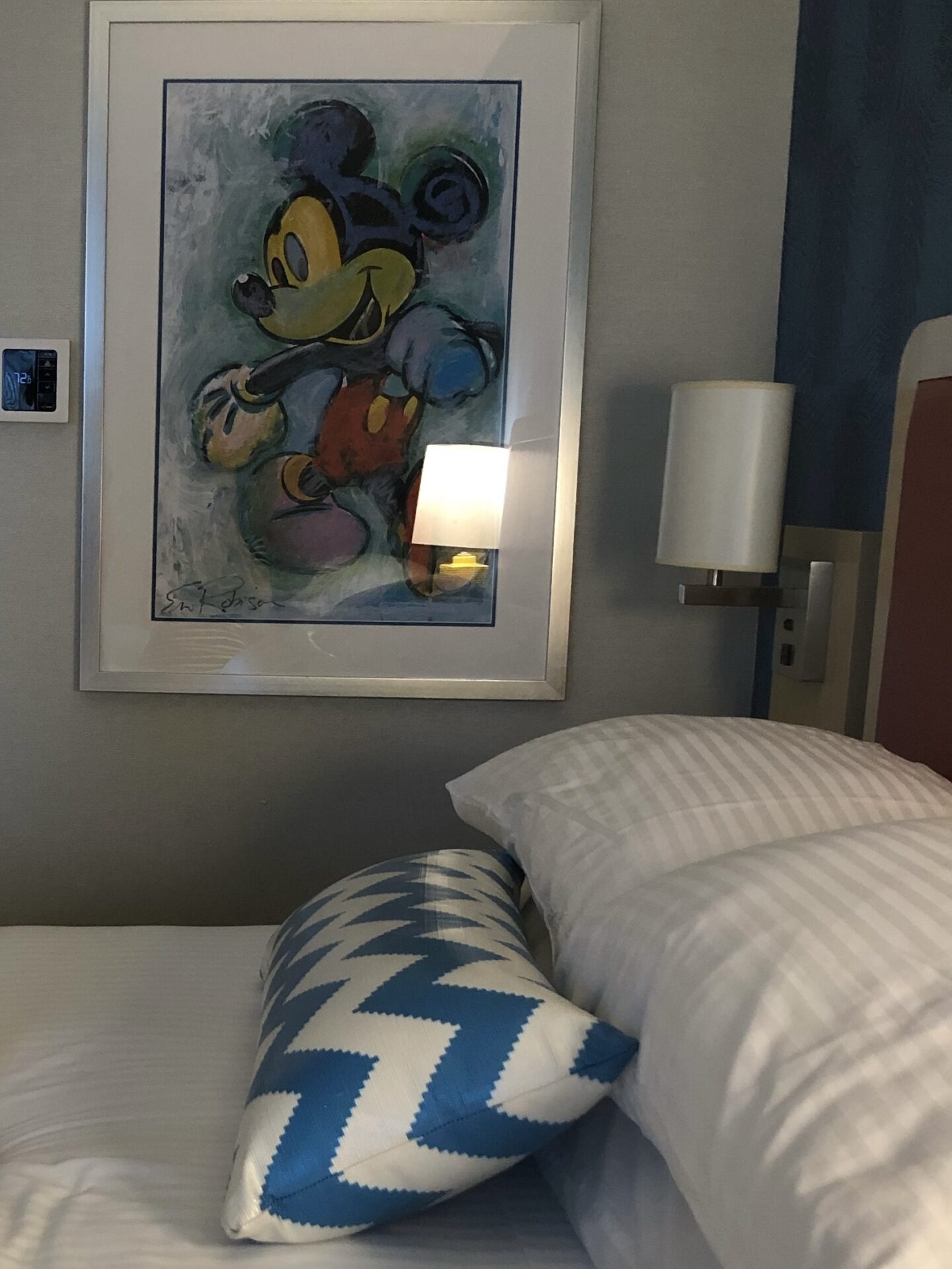 Mickey art and midcentury modern bed from Howard Johnson Hotel and Water Playground near Disneyland