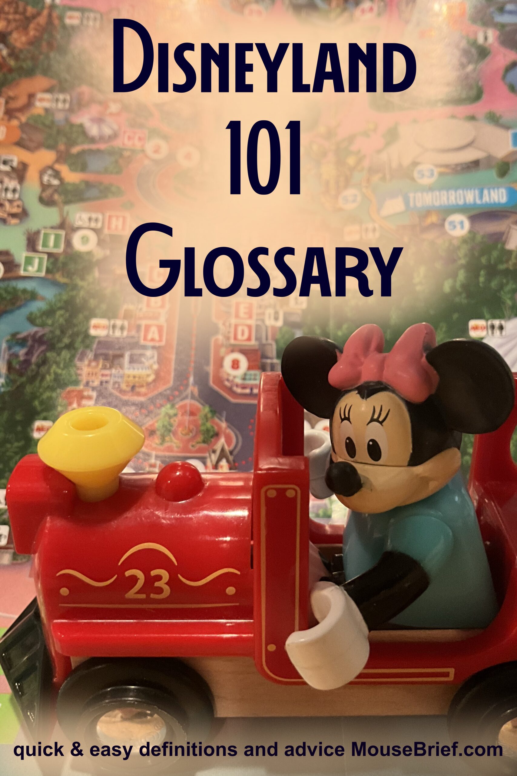 Photo of toy Minnie figure in red locomotive on map of Disneyland. Over the photo is the title “Disneyland 101 Glossary”