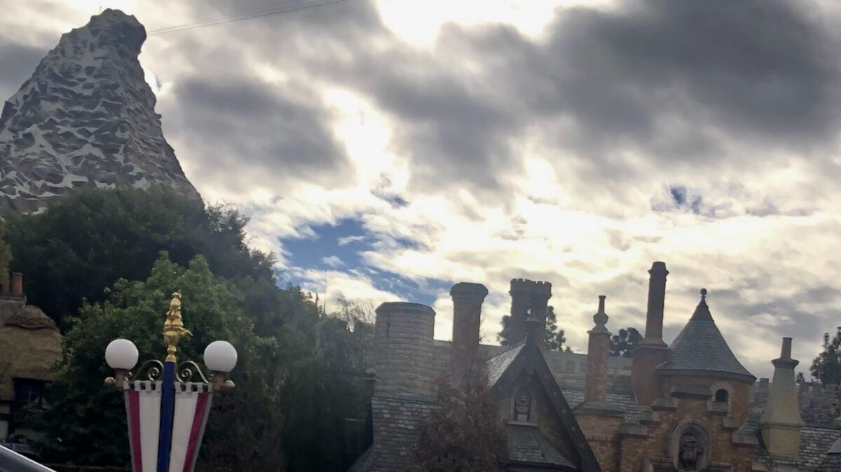 Cloudy skys above Fantasyland at Disneyland showing signs of rain to come.