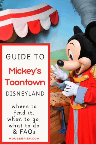 Photo of Mickey Mouse in Mickey’s Toontown at Disneyland. Mickey is in a red band uniform and his had is raised towards the title”Guide to Mickey’s Toontown Disneyland, where it find it, when to go, what to do and FAQs”