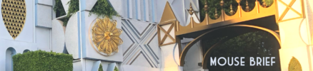 Close-up photo of “it’s a small world” facade from Disneyland Park also displaying the heading “MouseBrief”